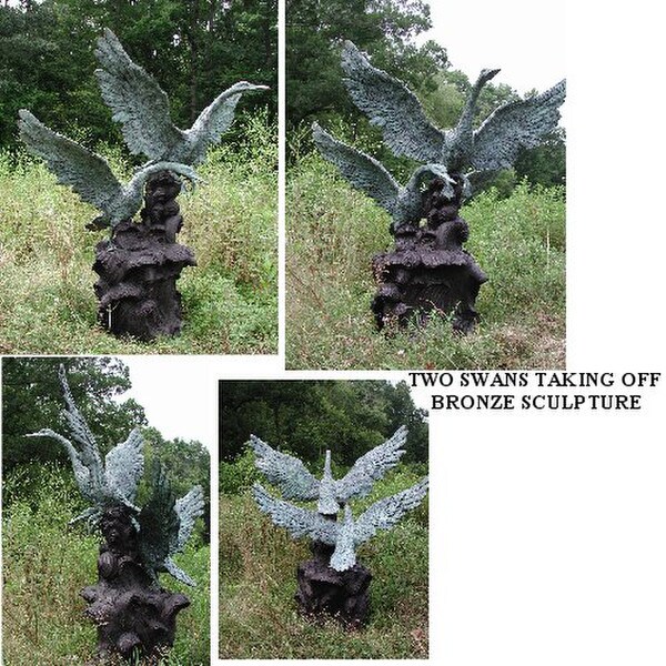 Two Swans Taking Off Bronze Sculpture taking flight fountain feature